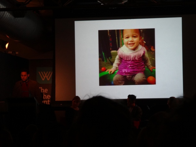 Ben's slide show featured a photograph of his son wearing a dress, which he used to illustrate the need for children to be free to explore their own identity
